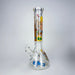 Glass water pipe with colorful designs on a gray background