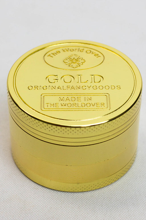 Gold 4 parts metal grinder in a display Display Pack ONE